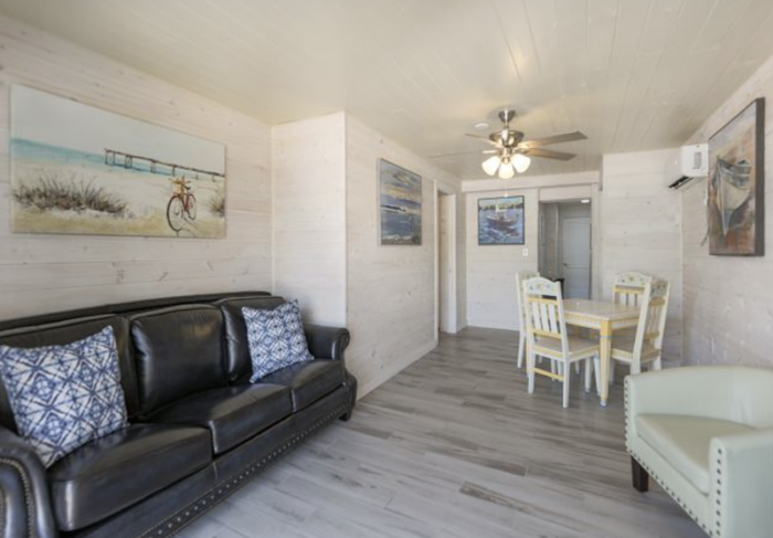 Captiva Island Hotel - Living Room with Sleeper sofa and dining area - 2-Bedroom Gardenia Villa